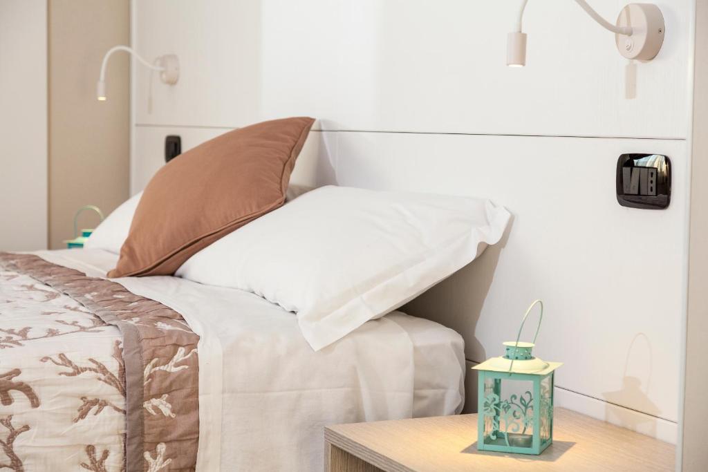 Posteľ alebo postele v izbe v ubytovaní Riviera HUB