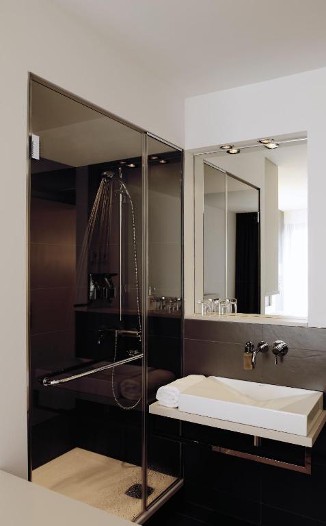 Koupelna v ubytování Hotel AMANO Rooms & Apartments