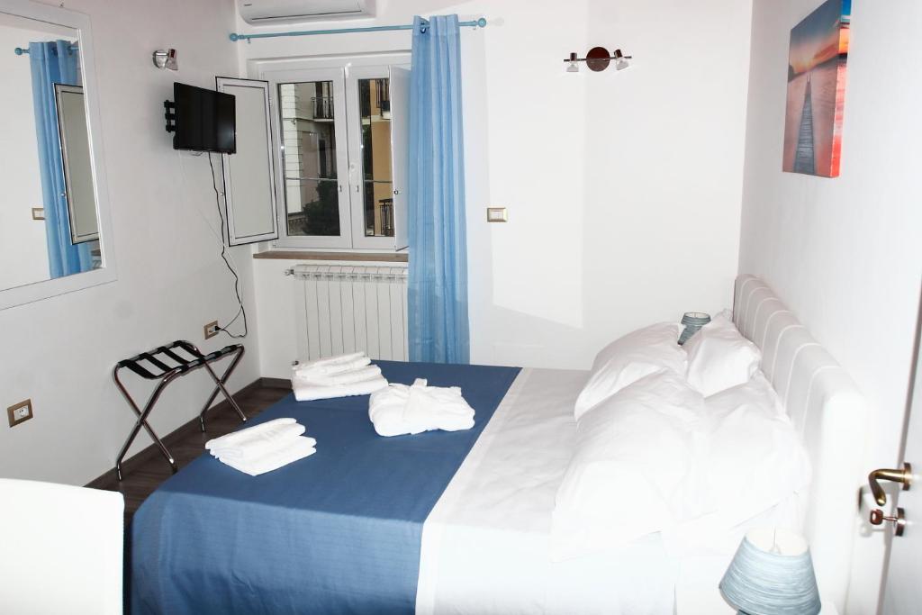 Postel nebo postele na pokoji v ubytování Residence Nina