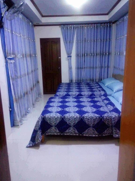 Postel nebo postele na pokoji v ubytování Mary Chiang Baguio Transient House