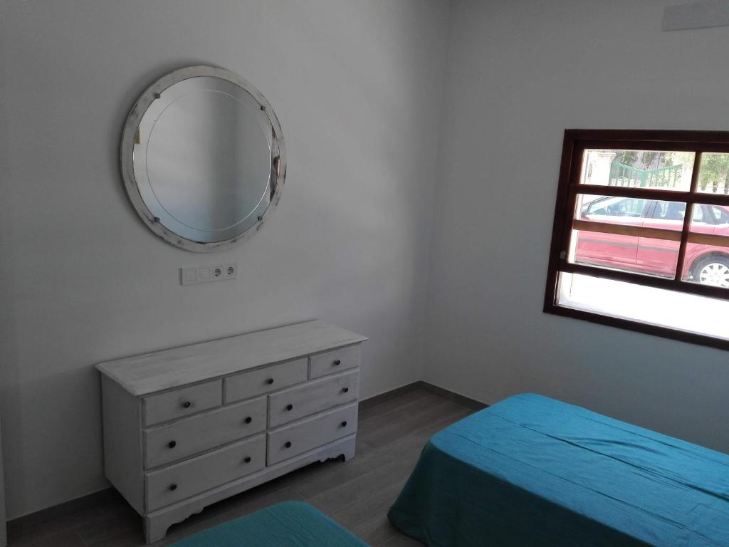 Postel nebo postele na pokoji v ubytování Sa Cala Beach House