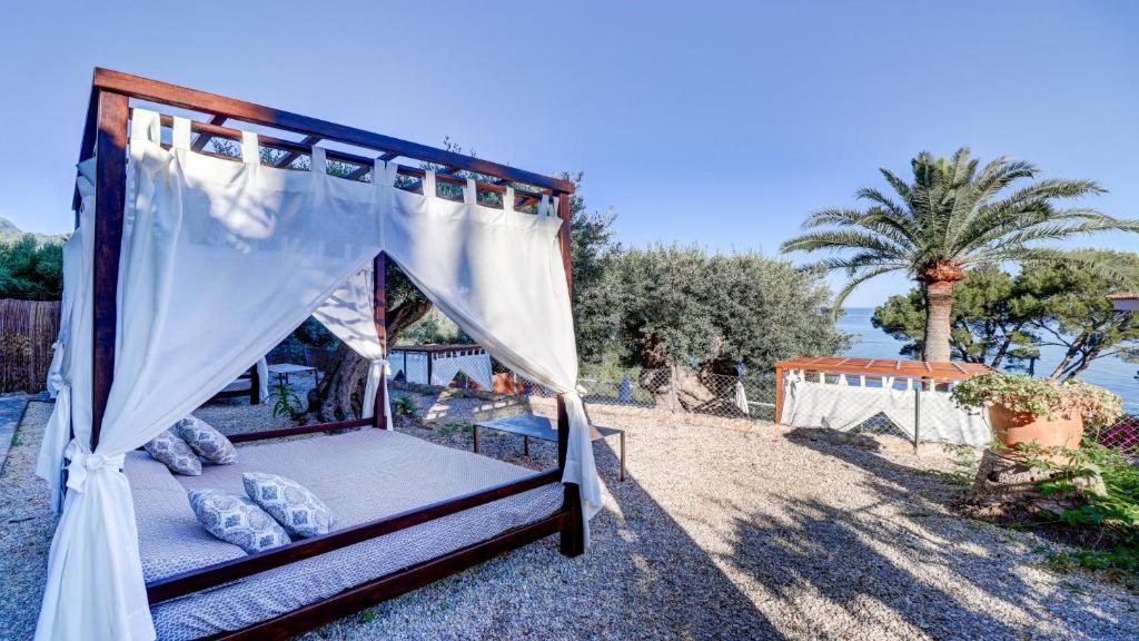Кровать или кровати в номере Hoposa Costa D'or - Adults Only