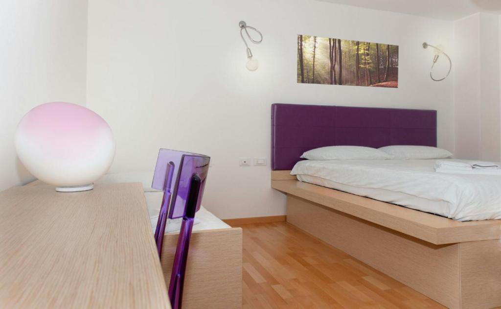 Posteľ alebo postele v izbe v ubytovaní Hotel Pramaggiore