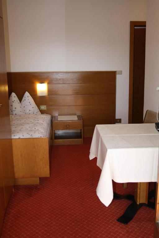 Postel nebo postele na pokoji v ubytování Garni Pöhl