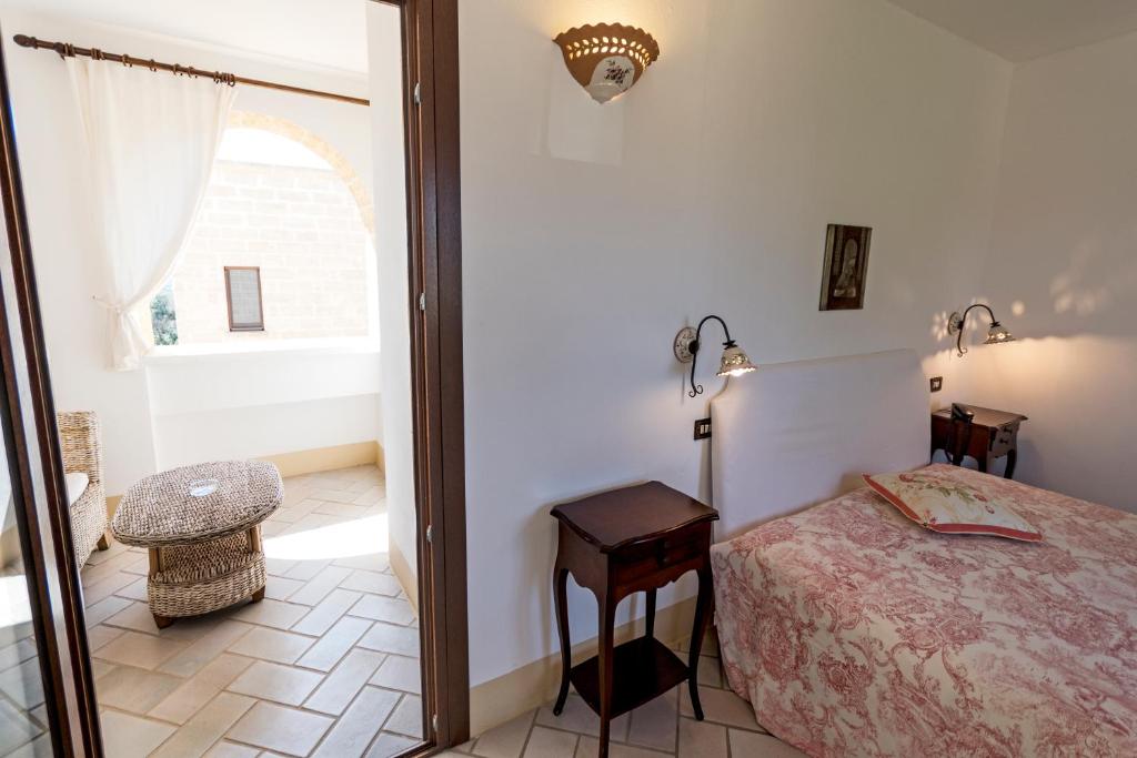 Postel nebo postele na pokoji v ubytování Masseria Ruri Pulcra