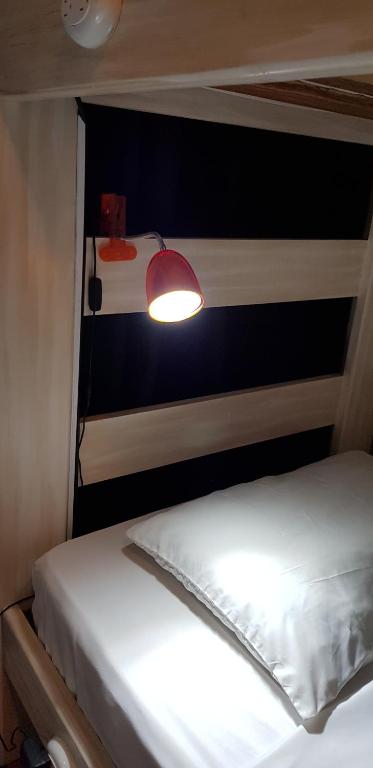 Postel nebo postele na pokoji v ubytování Noah boutique hostels Medellín