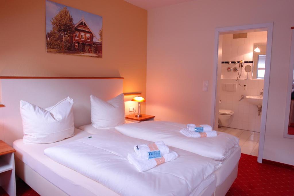 Ένα ή περισσότερα κρεβάτια σε δωμάτιο στο Pension Zeitlos