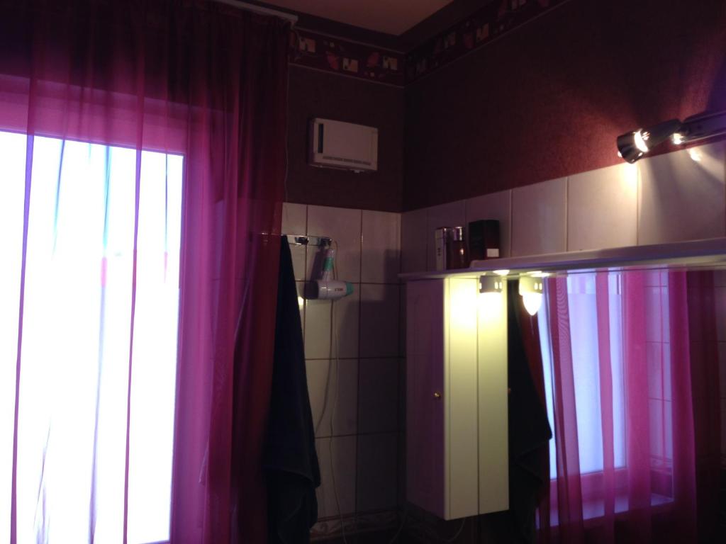 Kuchnia lub aneks kuchenny w obiekcie Tommy Apartman