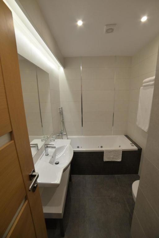 Koupelna v ubytování Hotel Arte
