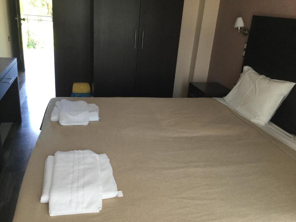 A bed or beds in a room at Villa Vasso