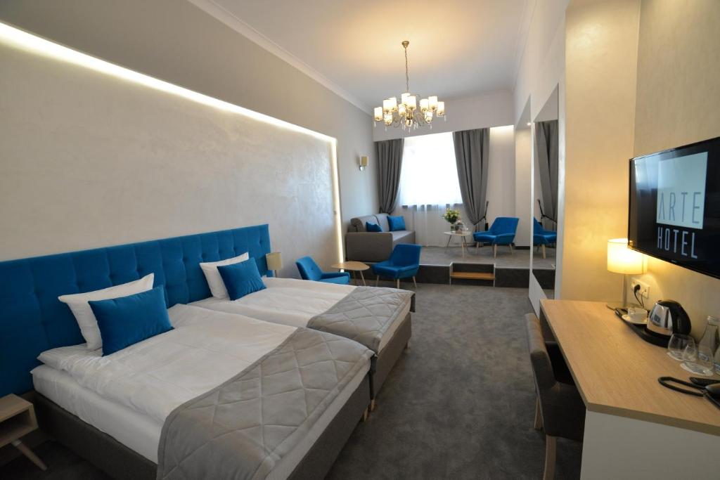 TV a/nebo společenská místnost v ubytování Hotel Arte