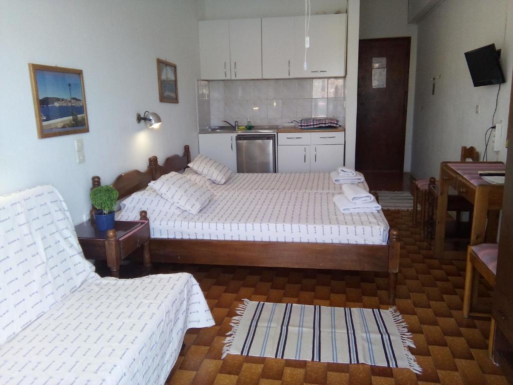 Postel nebo postele na pokoji v ubytování Bissias Guest House