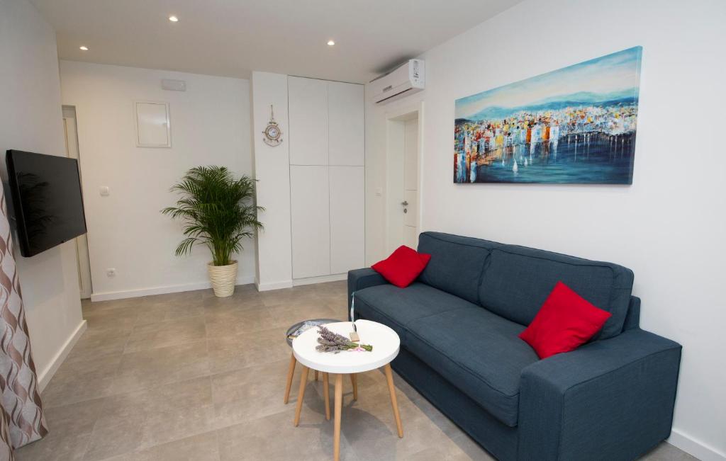 TV a/nebo společenská místnost v ubytování Apartments Lanterna