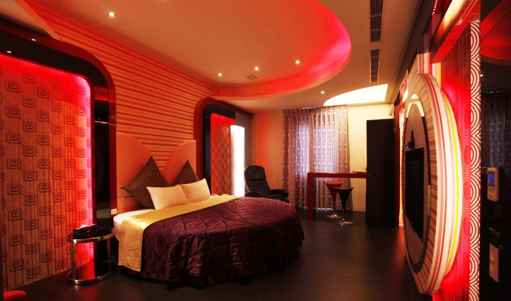 Letto o letti in una camera di Go Shine Motel