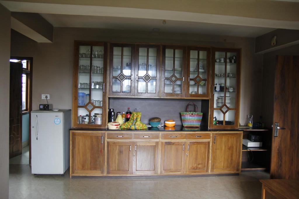 Cucina o angolo cottura di Vamoose Gomethang Homestay