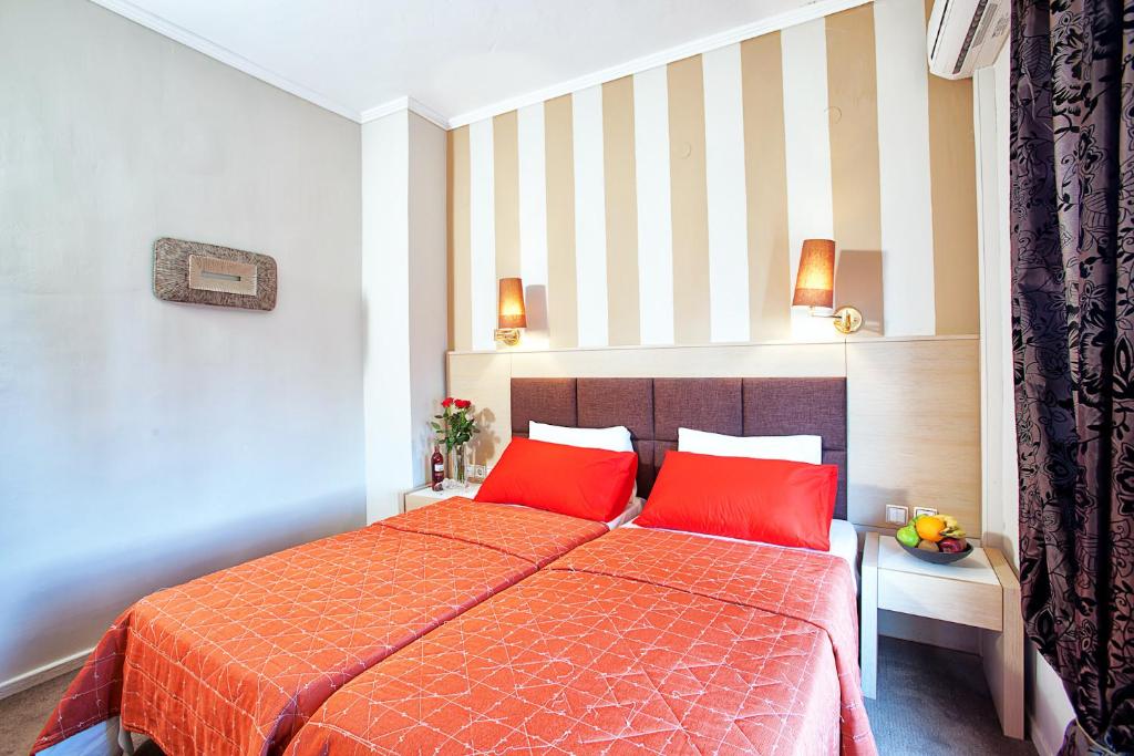 Ένα ή περισσότερα κρεβάτια σε δωμάτιο στο Anastassiou Hotel - Bike and motorcycle friendly hotel