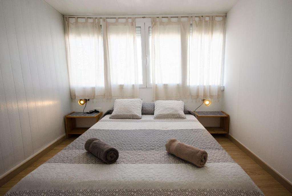 Posteľ alebo postele v izbe v ubytovaní Oscar Apartment Sol