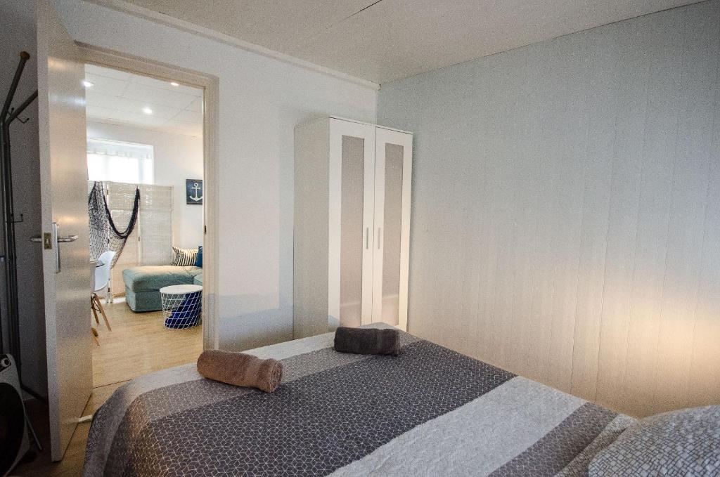 Posteľ alebo postele v izbe v ubytovaní Oscar Apartment Sol