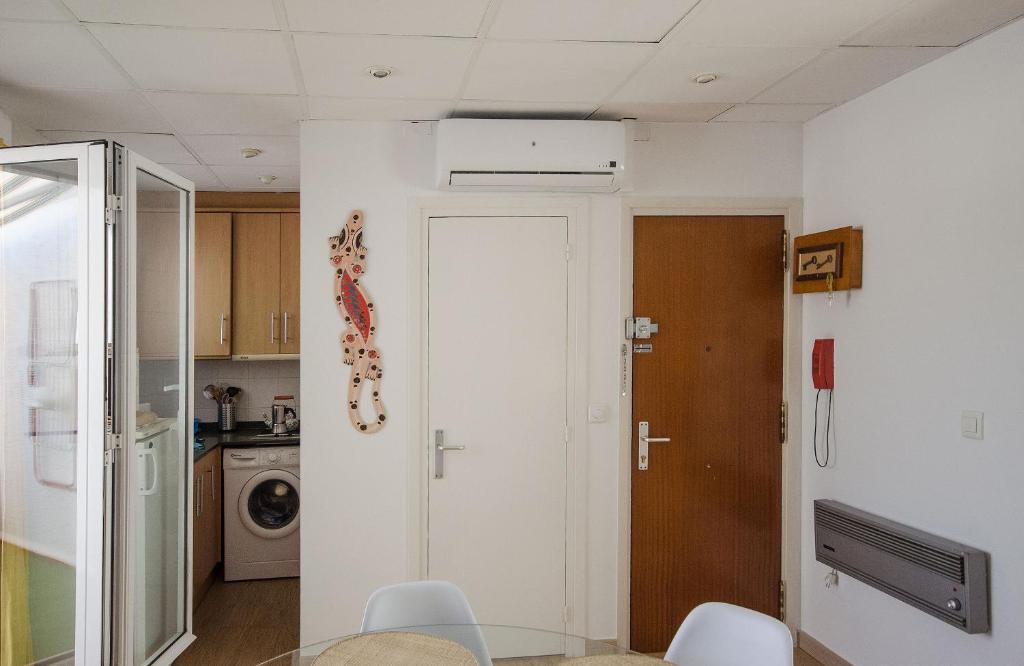 Kuchyňa alebo kuchynka v ubytovaní Oscar Apartment Sol