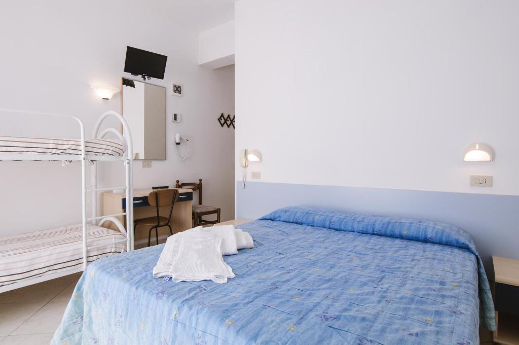 Postel nebo postele na pokoji v ubytování Hotel Edelweiss