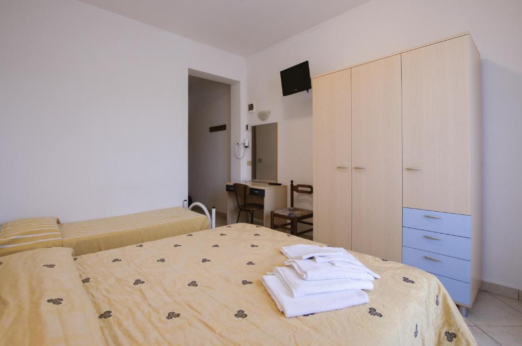 Postel nebo postele na pokoji v ubytování Hotel Edelweiss