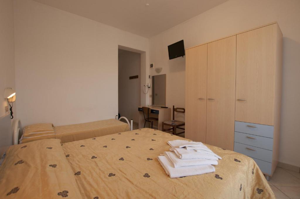 Postel nebo postele na pokoji v ubytování Hotel Edelweiss