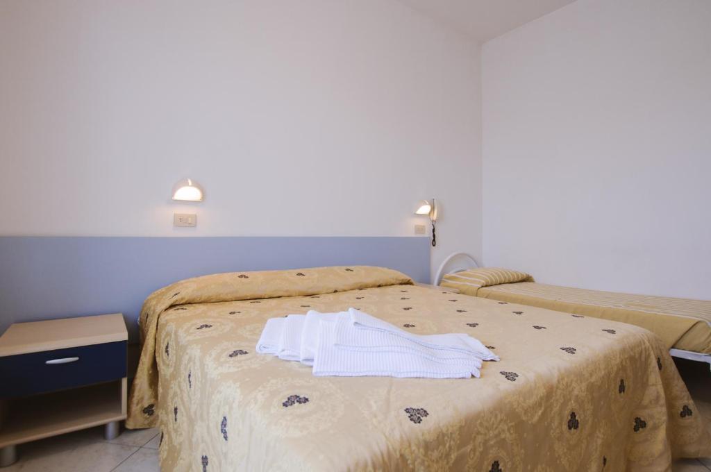 Postel nebo postele na pokoji v ubytování Hotel Edelweiss