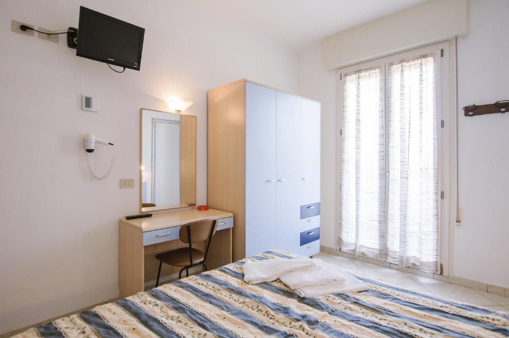 Postel nebo postele na pokoji v ubytování Hotel Edelweiss