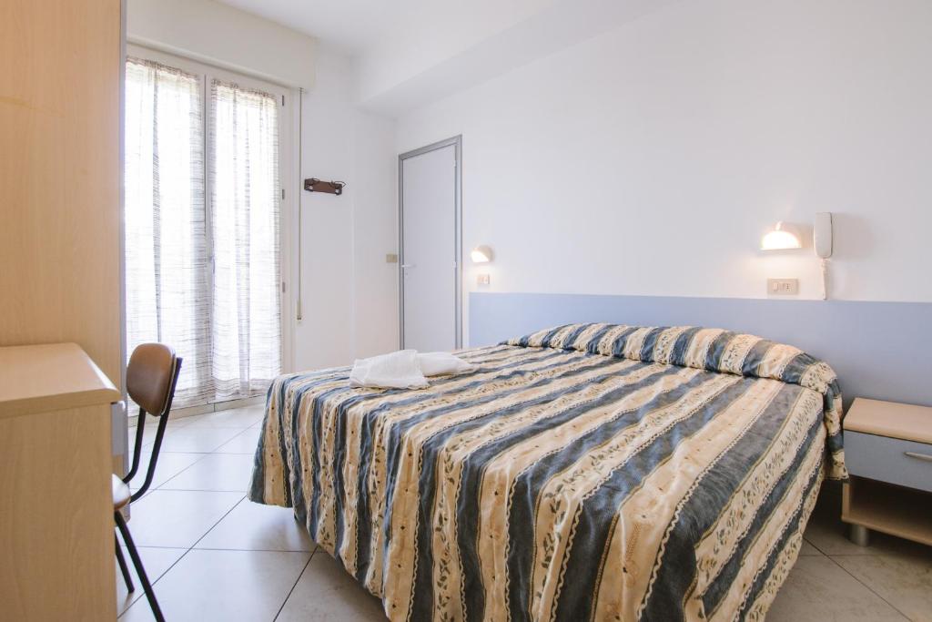 Postel nebo postele na pokoji v ubytování Hotel Edelweiss