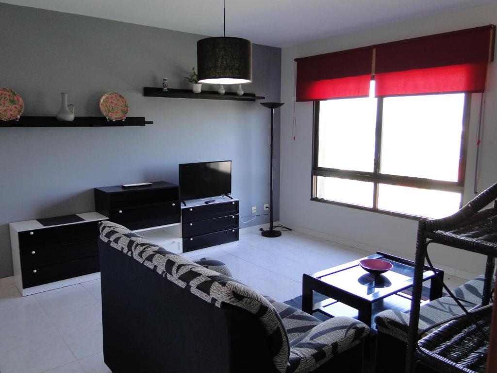 Posedenie v ubytovaní Apartamentos Blanco