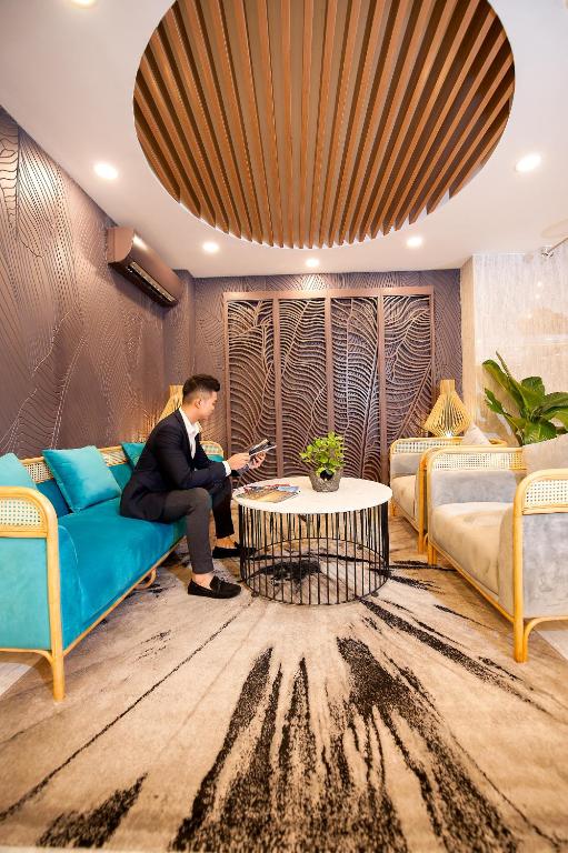 Posezení v ubytování Adora Hotel