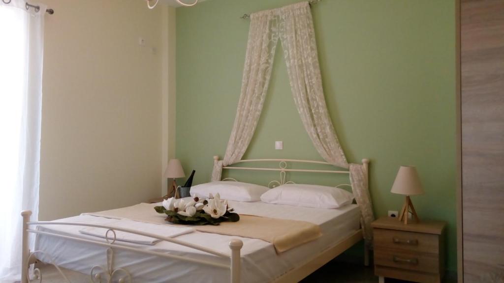 Posteľ alebo postele v izbe v ubytovaní John Apartments