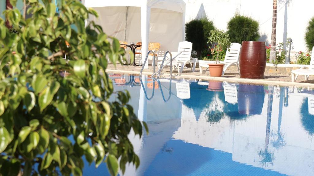 Bazén v ubytování Tanger Med Hotel, Conference & Catering nebo v jeho okolí