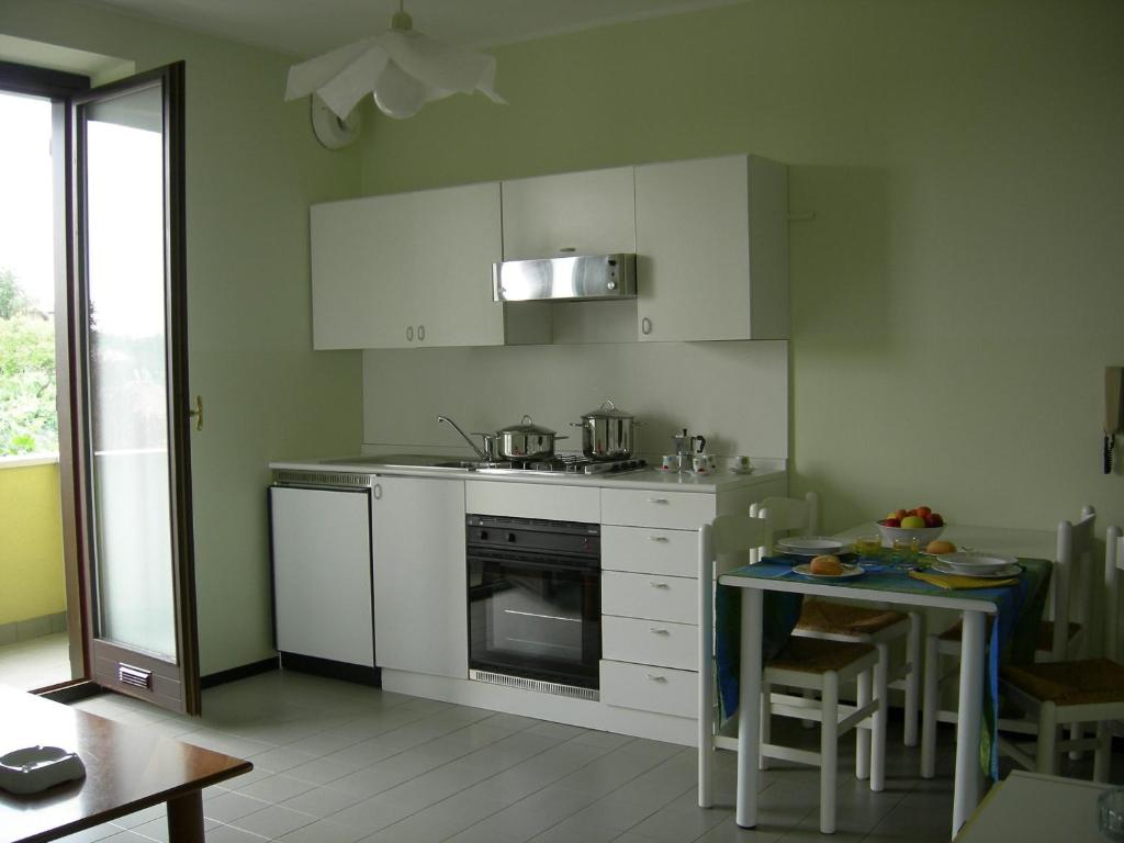 Kuchyň nebo kuchyňský kout v ubytování Albergo Residence Isotta