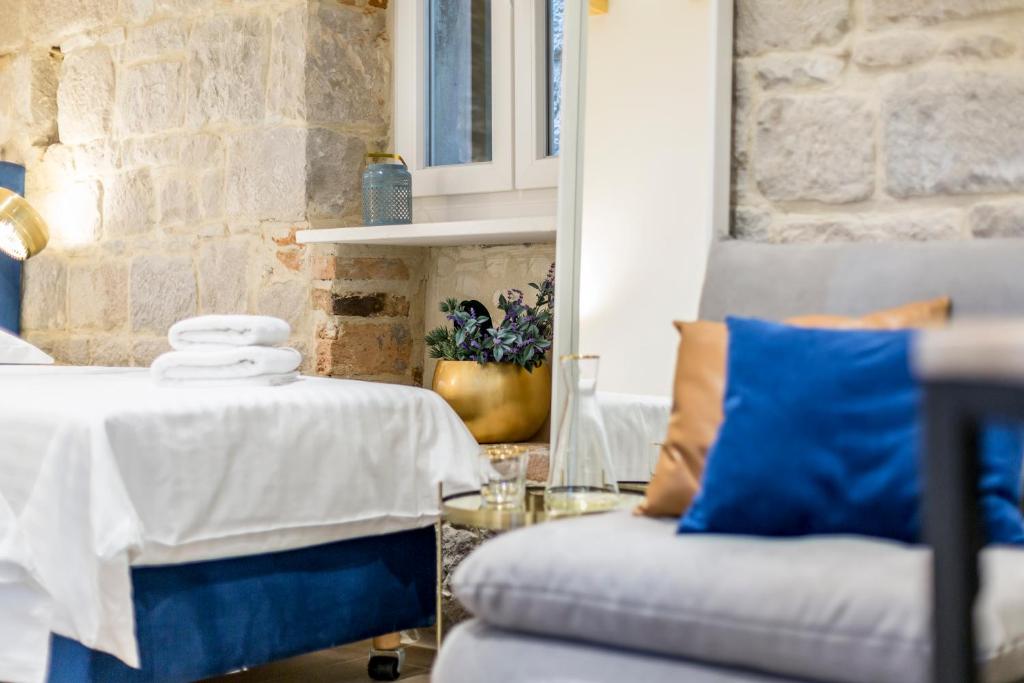 Postel nebo postele na pokoji v ubytování Miara Luxury Rooms
