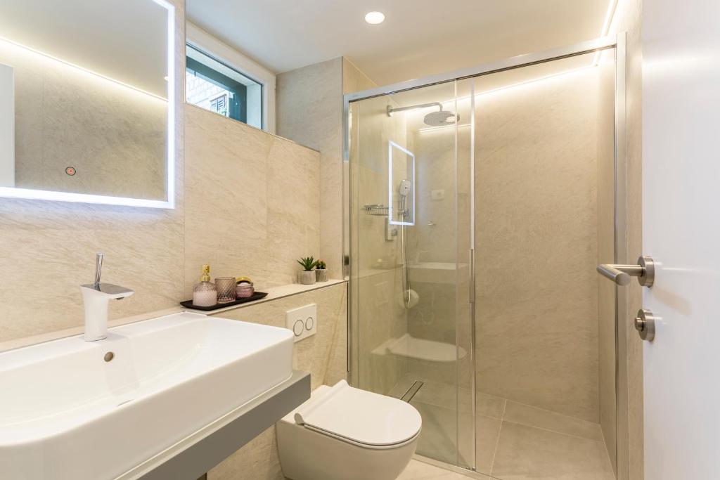 Koupelna v ubytování Miara Luxury Rooms