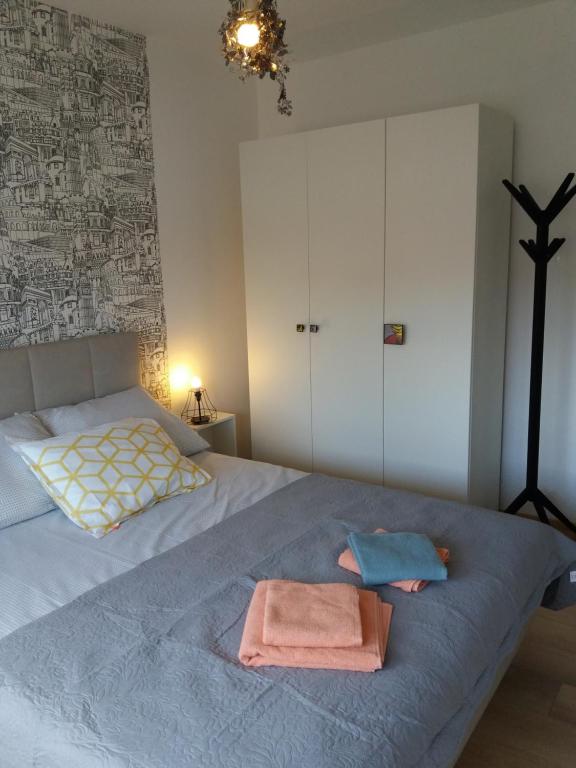 Postel nebo postele na pokoji v ubytování Lola app in city center, 4+1 pax
