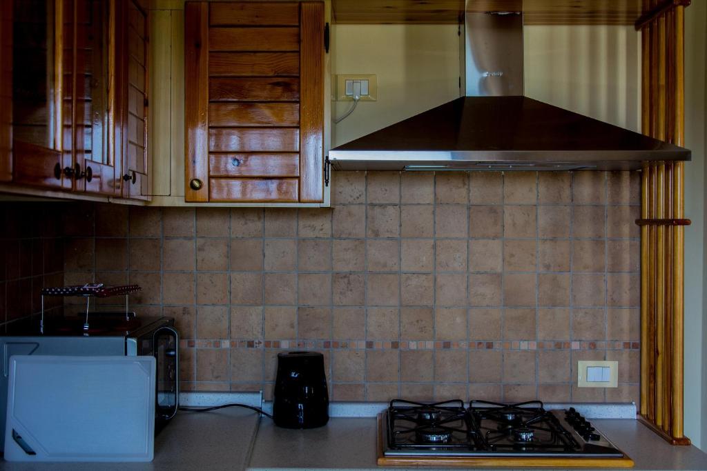 Kuchyň nebo kuchyňský kout v ubytování Casa Sirio