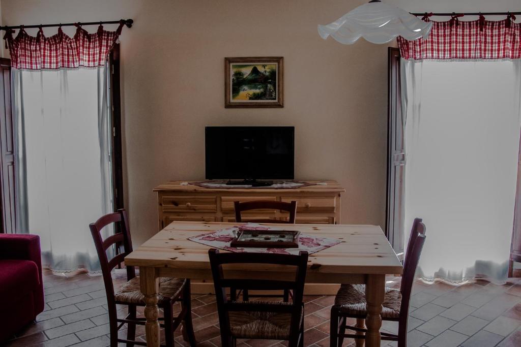 TV a/nebo společenská místnost v ubytování Casa Sirio