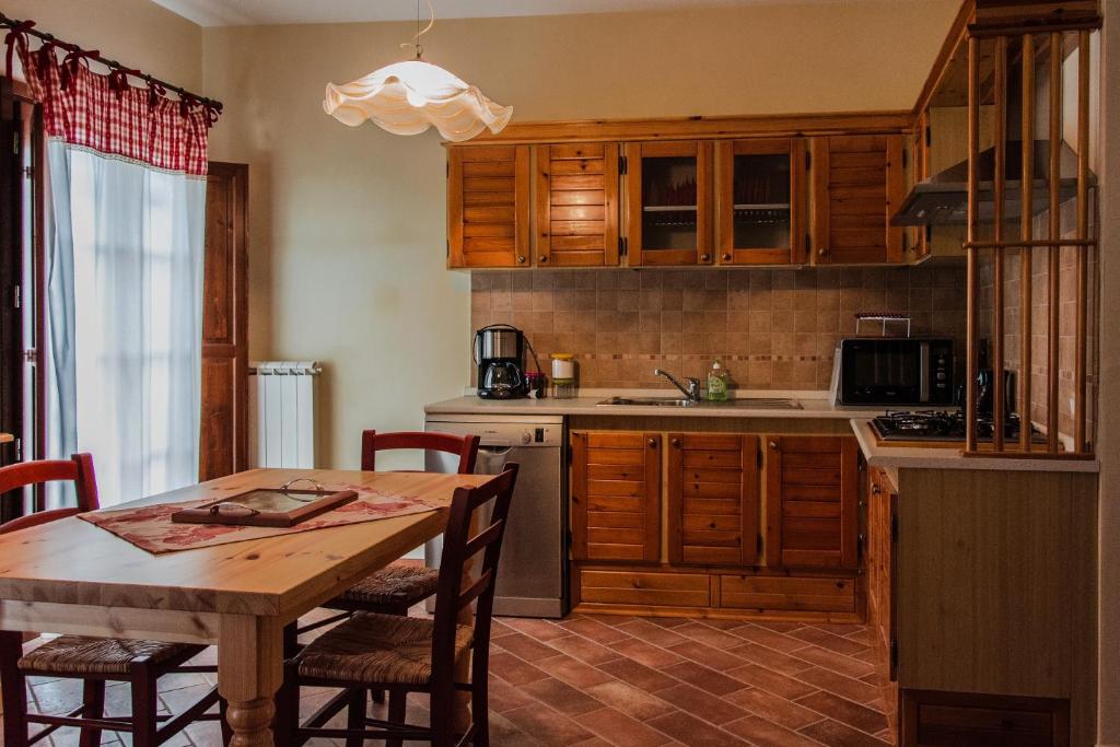 Kuchyň nebo kuchyňský kout v ubytování Casa Sirio
