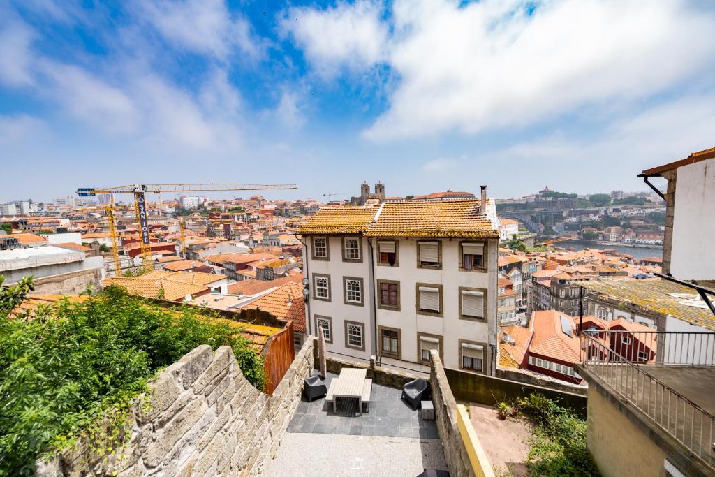 a view of a city from a building at Merc Porto Vitoria's Place in Porto