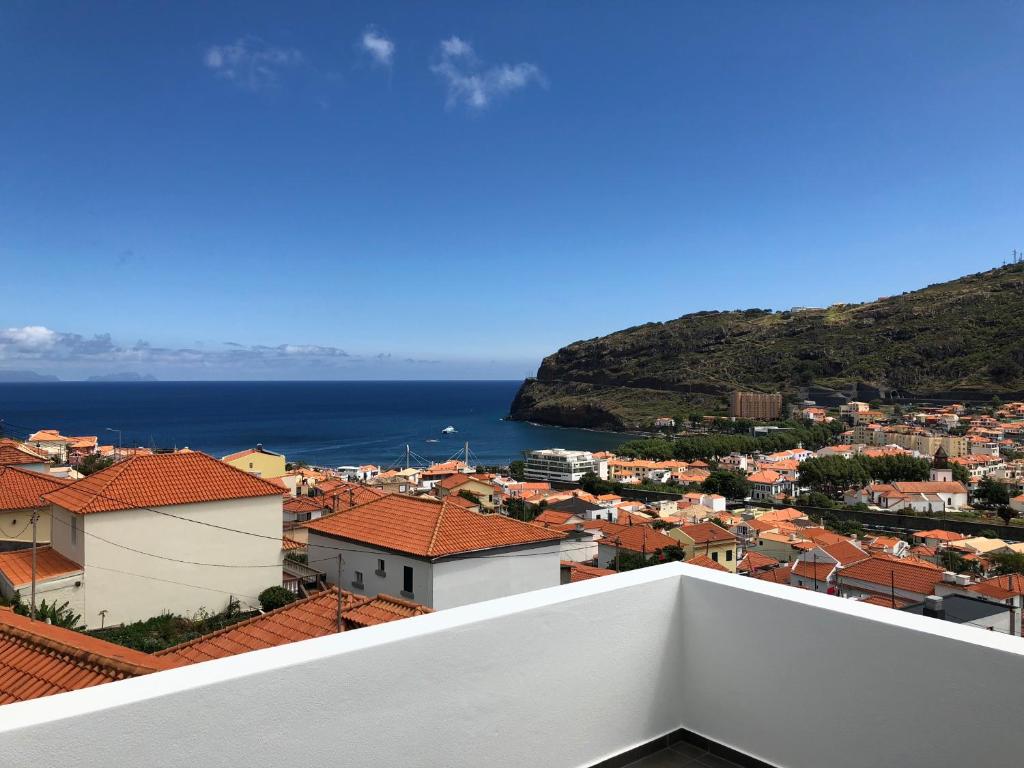 a view of a city from the roof of a building at Casa da Graça by AnaLodges in Machico