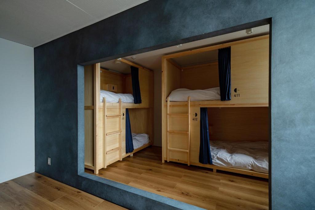 Postel nebo postele na pokoji v ubytování EN hostel
