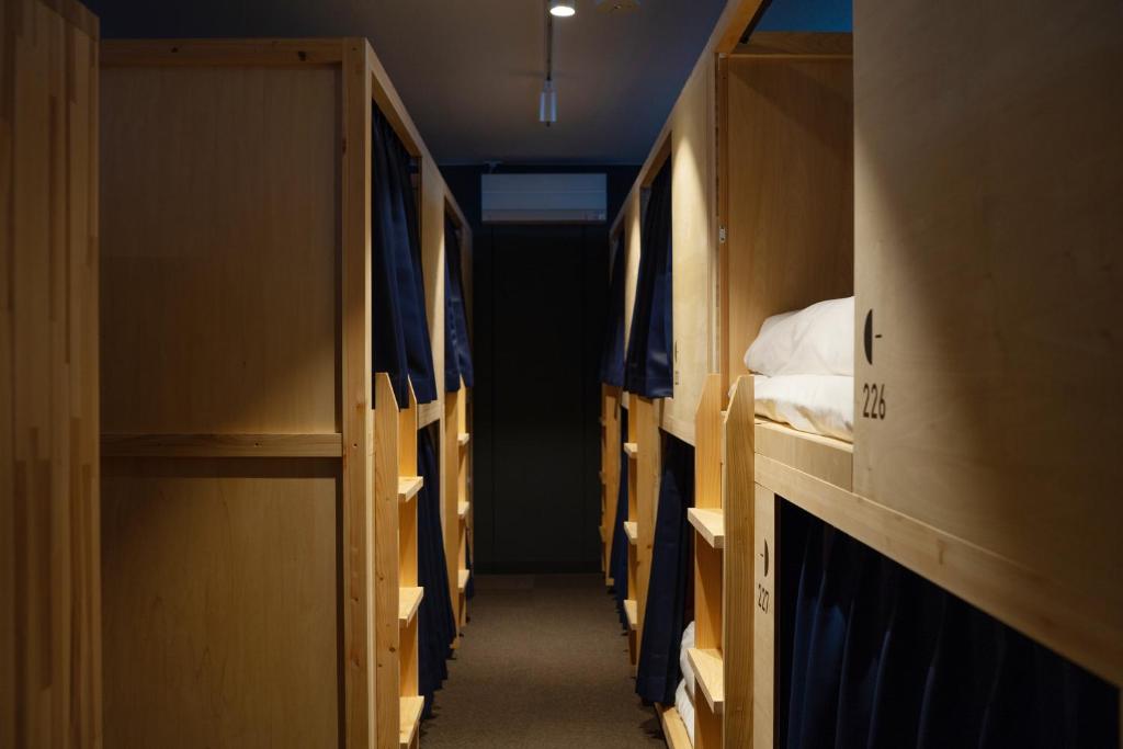 Postel nebo postele na pokoji v ubytování EN hostel