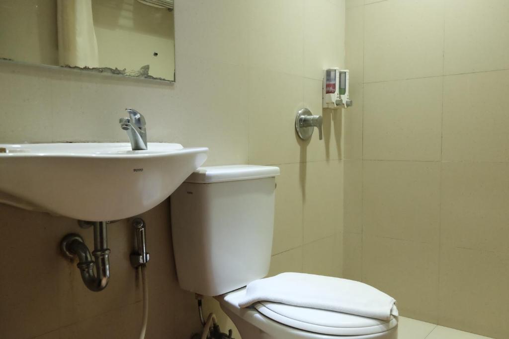 Koupelna v ubytování Grand Sakura Hotel