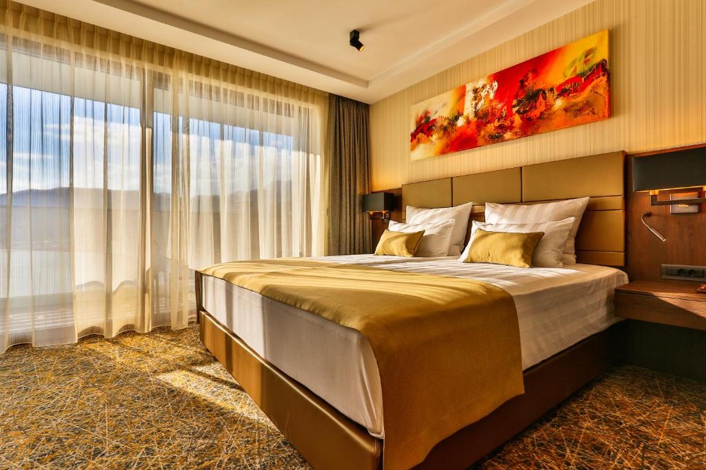 Postel nebo postele na pokoji v ubytování Hotel Zeta