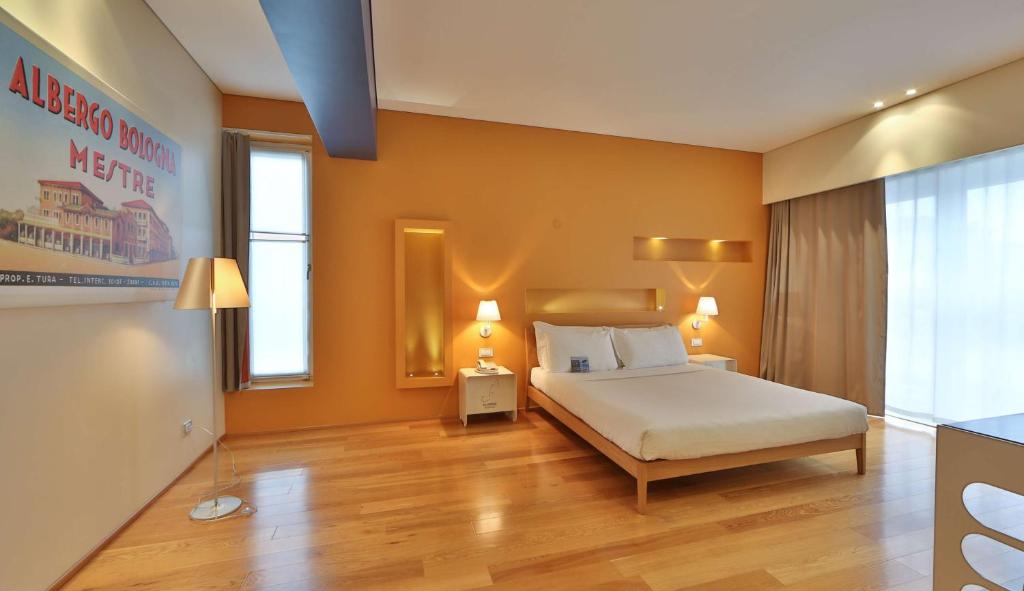 Postel nebo postele na pokoji v ubytování Best Western Plus Hotel Bologna