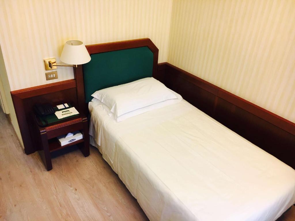 Postel nebo postele na pokoji v ubytování Hotel Astoria Sure Hotel Collection By Best Western