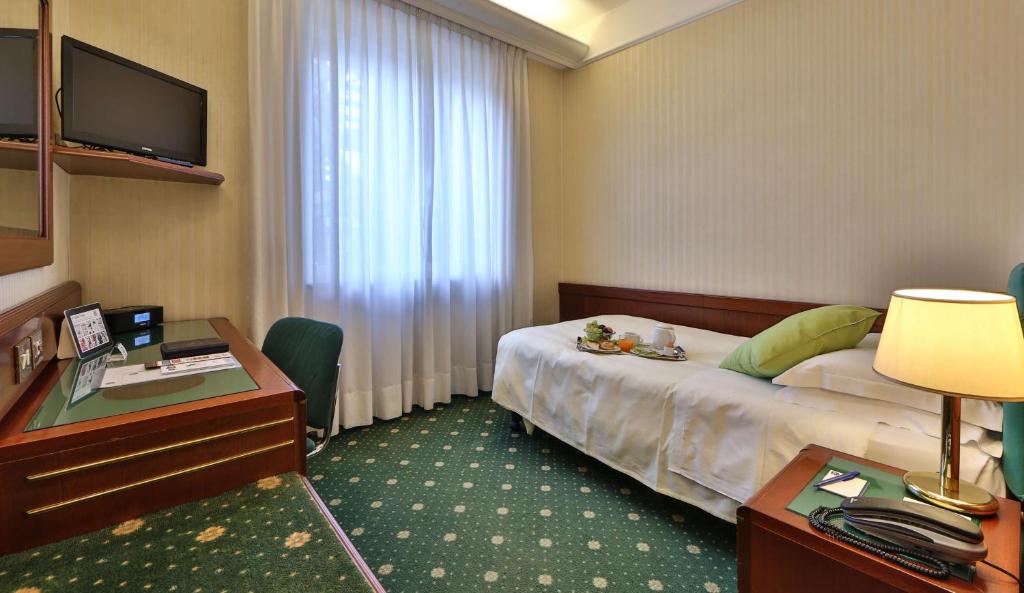 Postel nebo postele na pokoji v ubytování Hotel Astoria Sure Hotel Collection By Best Western