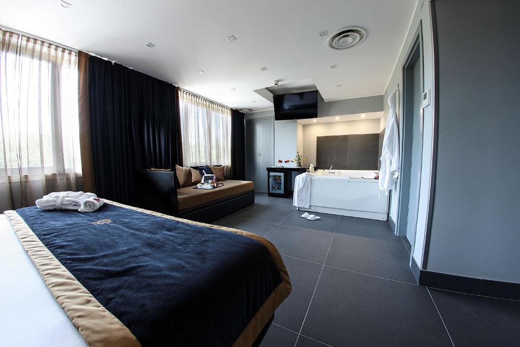 Postel nebo postele na pokoji v ubytování Best Western JFK Hotel